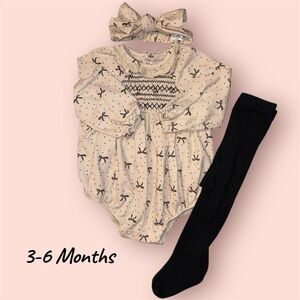 Cream Baby Romper with Black Tights